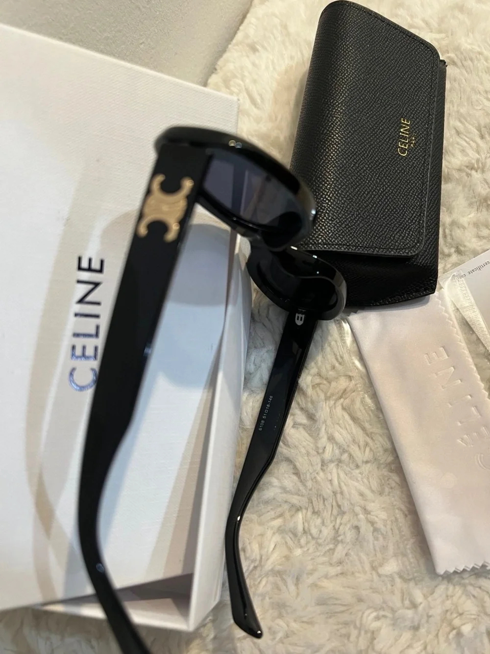 Celine Black Oval Sunglasses with Gold Logo Detail